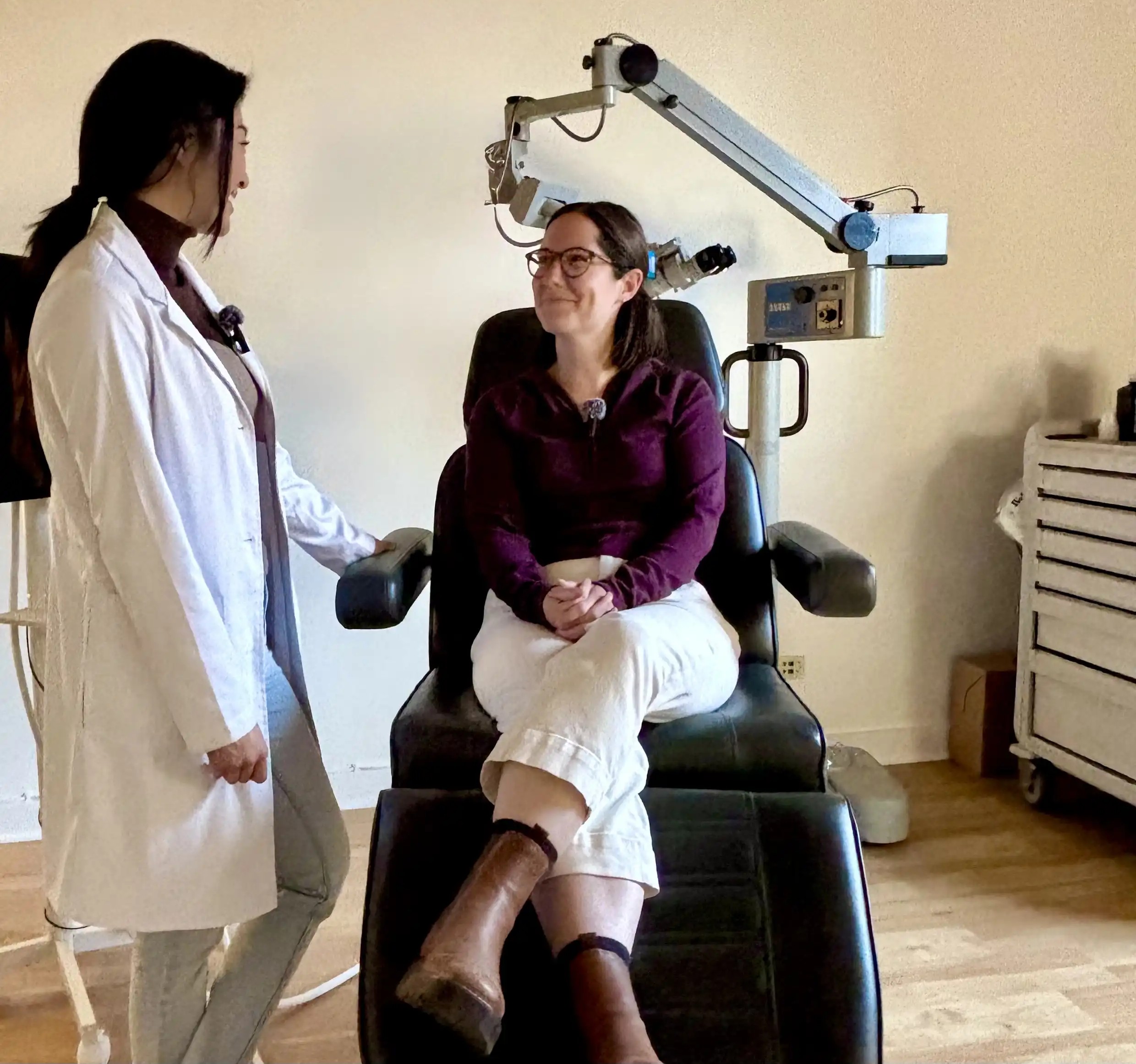 Patient relaxing in treatment chair during a microsuction ear cleaning appointment at CERA Ear Clinic.